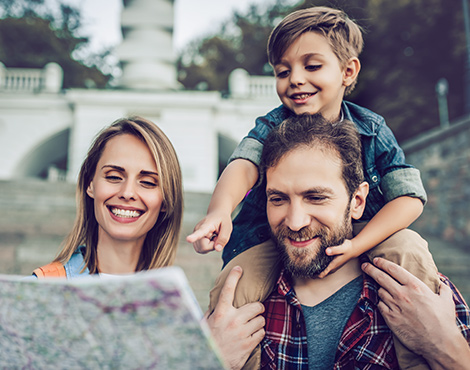 A family looking at a road map