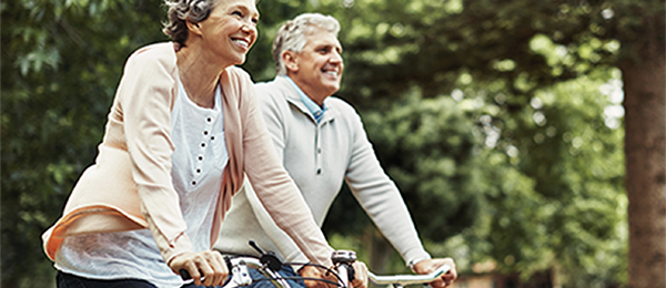 Man and woman riding bicycles